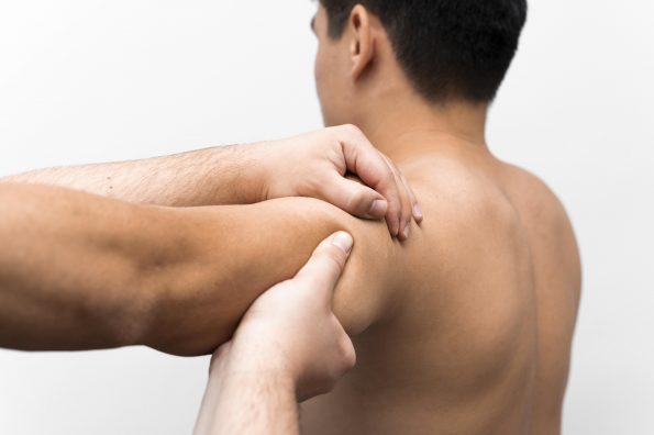 man-getting-shoulder-massage-from-physiotherapist