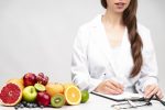 nutritionist-having-healthy-fruit-snack
